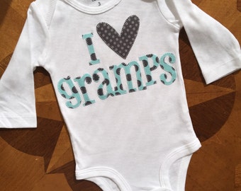 Custom appliqued baby onesie in turquoise and gray fabrics