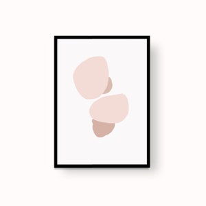 May include: A framed abstract art print with three pink and brown organic shapes on a white background.