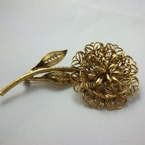 SALE   Vintage gold tone multi-dimensional brooch.