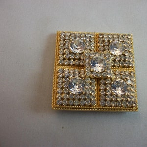 Vintage Capri 5-domed gold tone and clear rhinestone pendant or brooch.