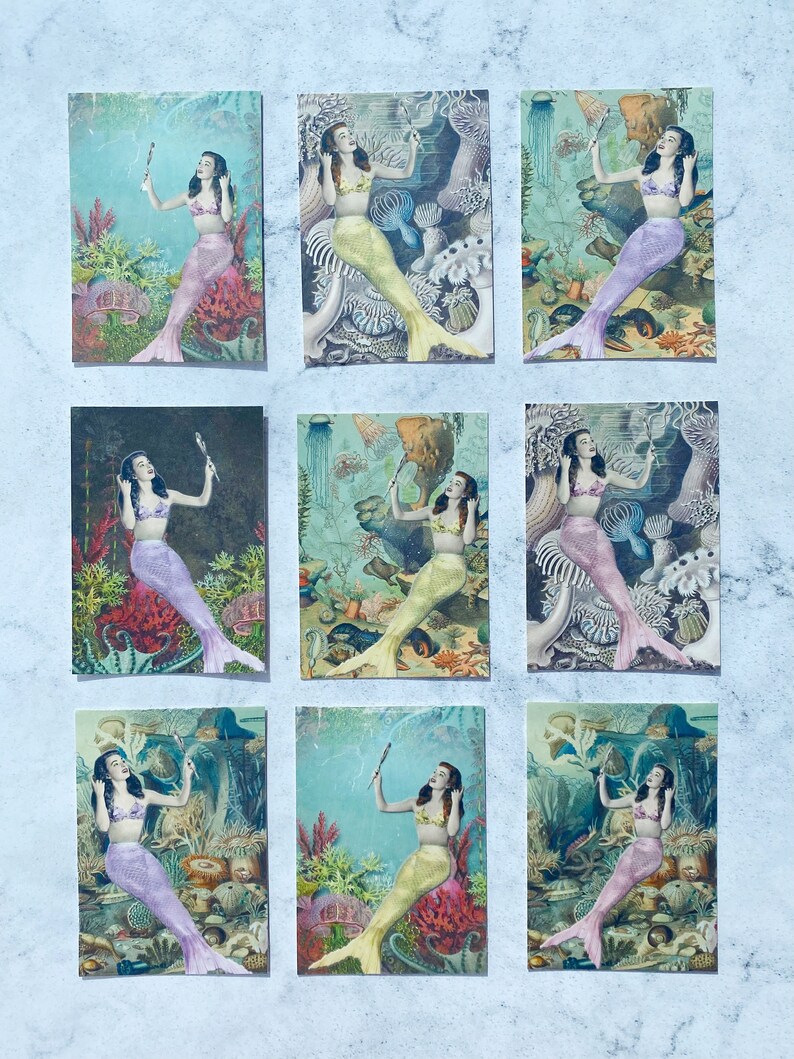 May include: Nine vintage postcards featuring illustrations of mermaids with colorful tails and seashells. Each postcard has a different background with coral, seaweed, and other ocean life.