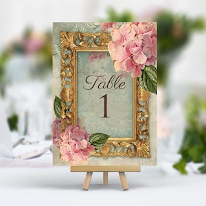 Numéros de table de mariage anciens, noms, cadre vintage avec dentelle et fleurs