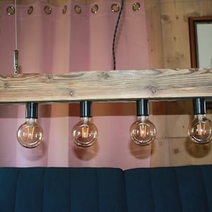Lamp made from an antique, beautiful wooden beam&quot; permanently installed sockets&quot;steel cable suspension&quot;