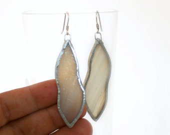 Off white glass long drop earrings in stained glass and sterling silver, dangle leaves jewellery, sea shell pendant earrings, modern jewels