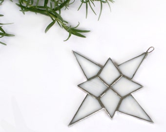 Christmas decorations in white star shape for tree or home decor Tiffany tecnique.