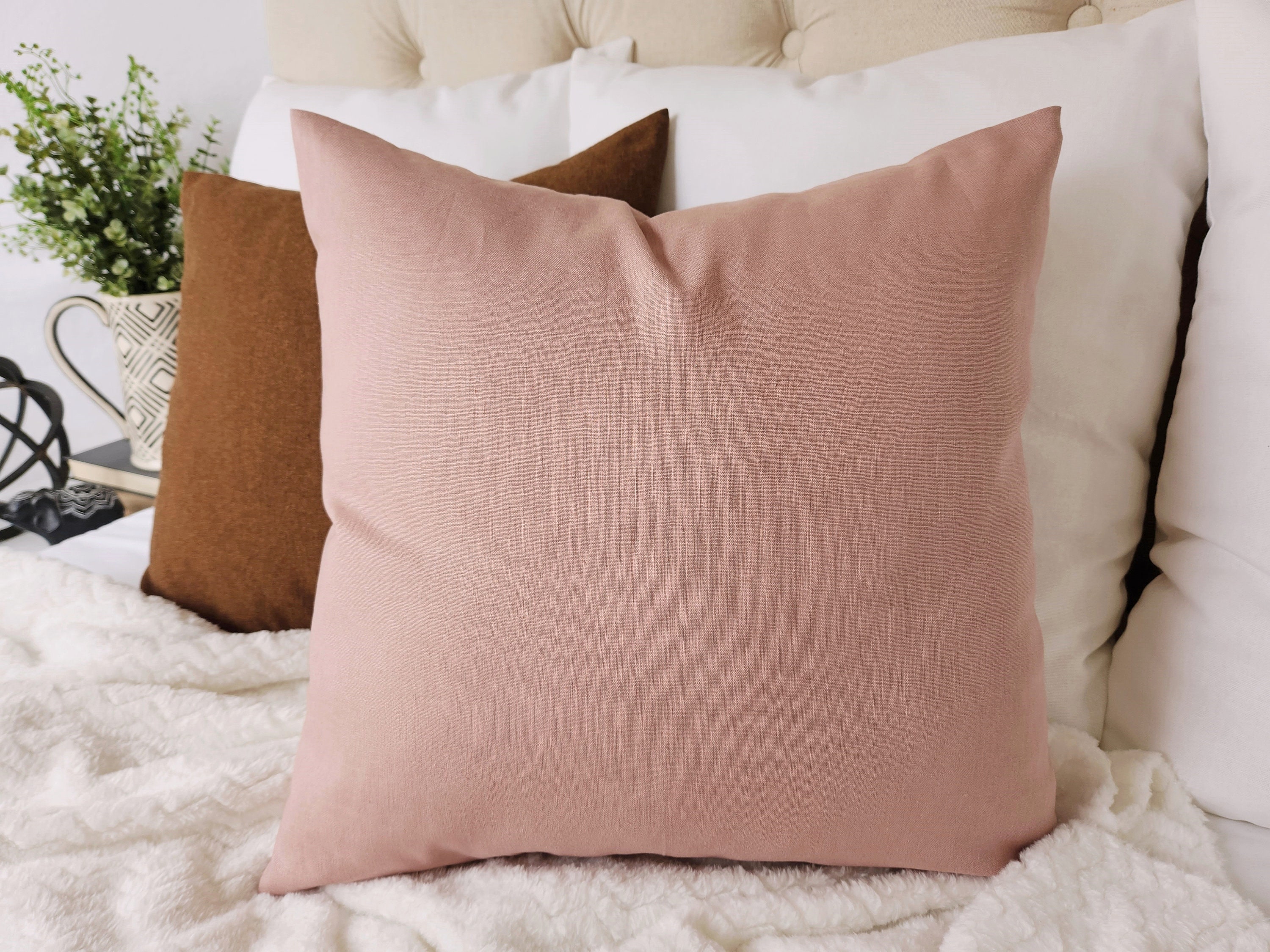 pink and brown pillows