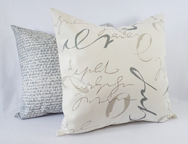 grey and cream pillow covers