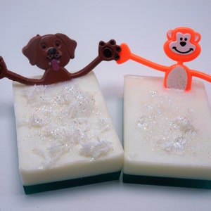 Dirty Dawg or Funky Monkey will get your kids in the bath - and get them clean Goat Milk & Shea butter soap gentle on the skin. Bendable toy