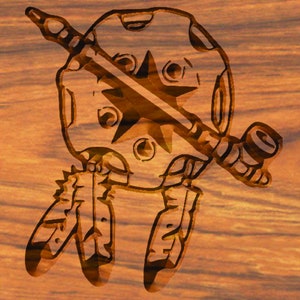 May include: A wooden carving of a Native American dreamcatcher with a star in the center and feathers hanging from the bottom. The dreamcatcher is decorated with a pipe.