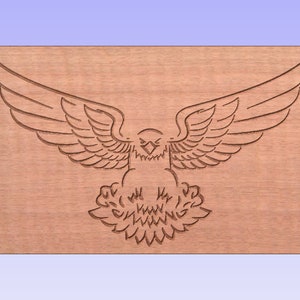 May include: A wood carving of an eagle with its wings spread wide. The eagle is facing forward with its head held high. The carving is detailed and intricate, with feathers and talons clearly visible.