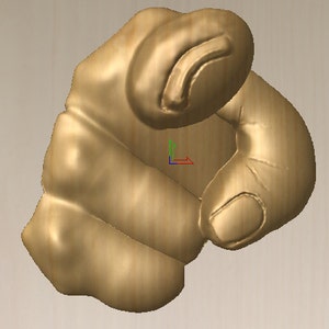 May include: A wooden hand sculpture with a finger pointing directly at the viewer.