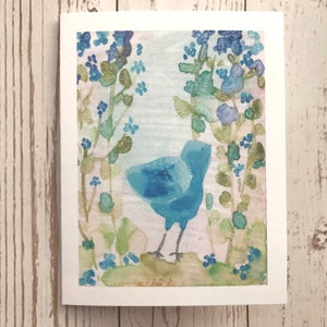 Watercolor blue bird painting greeting card with flowers