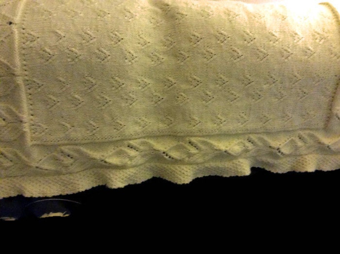 Bright yellow baby boy or girl blanket in soft fingering baby yarn.