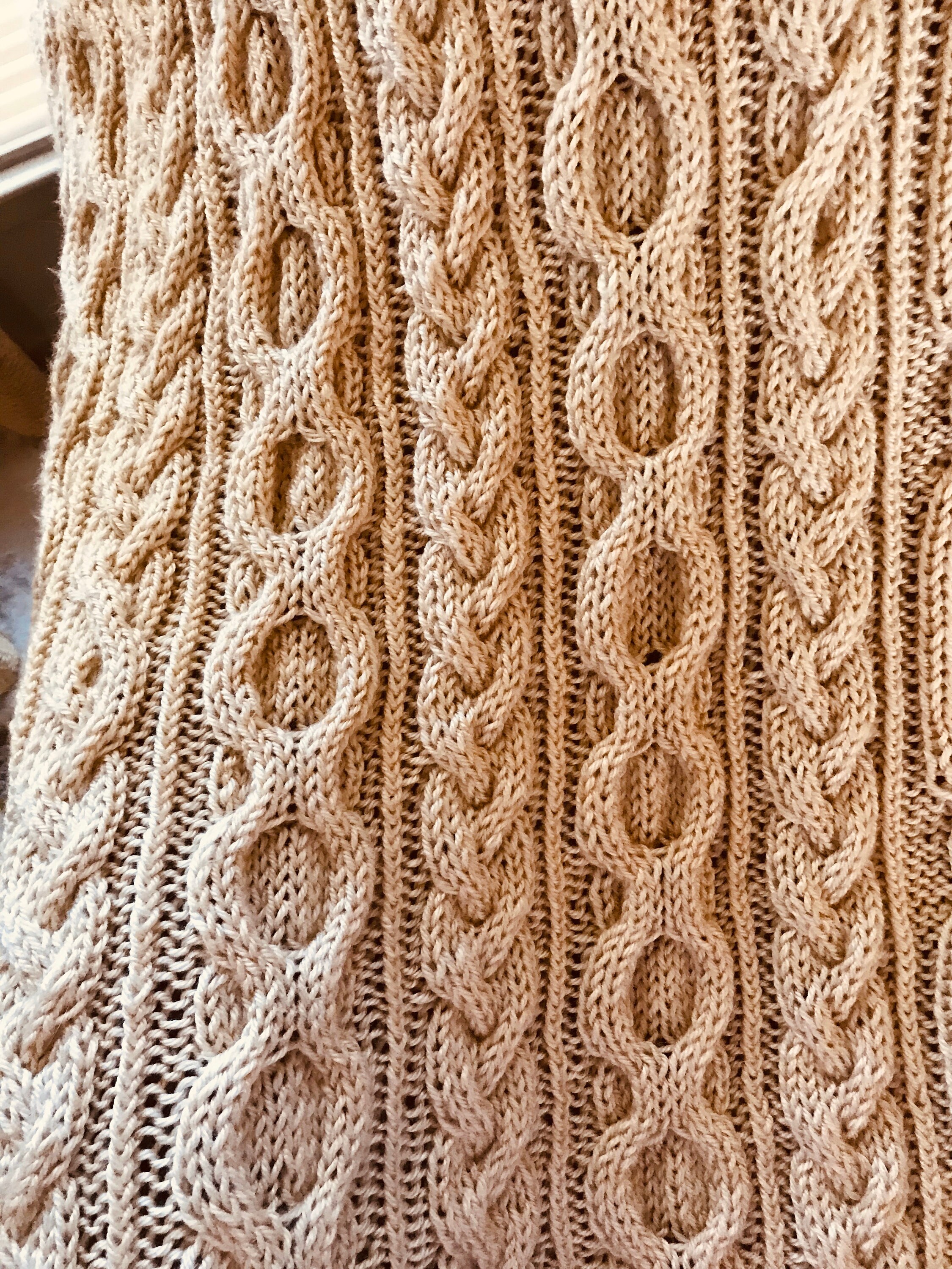 Knitted cable afghan