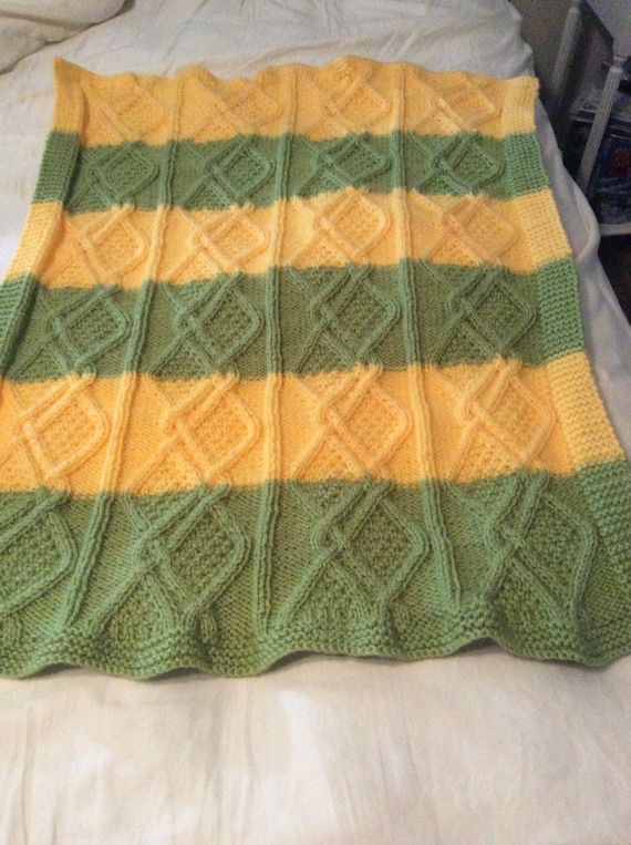 Medium size yellow and green cable baby blanket