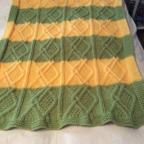 Medium size yellow and green cable baby blanket