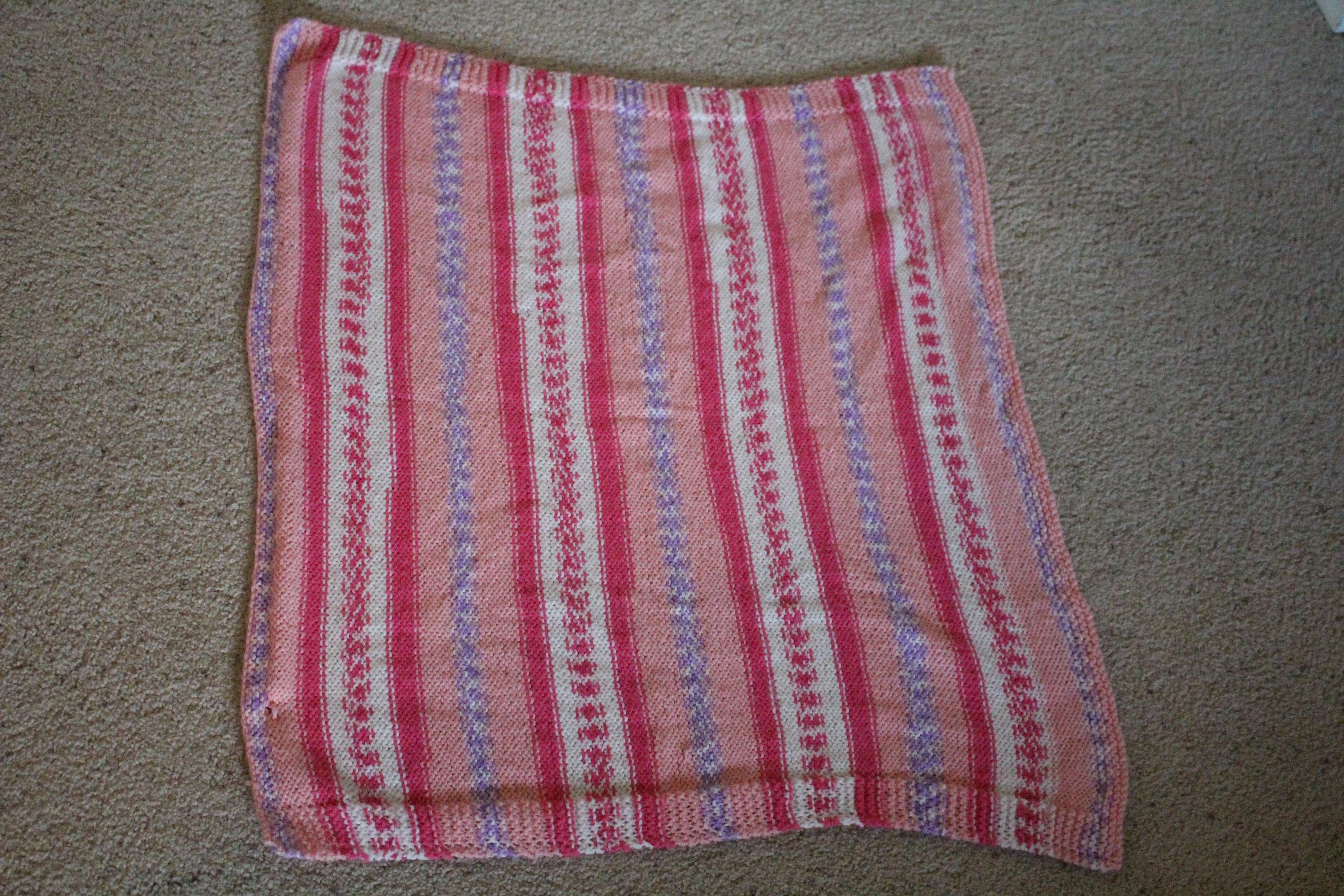 Baby blanket made with 100 Acrylic yarn.