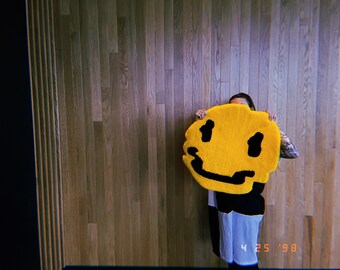 melting smiles tufted rug