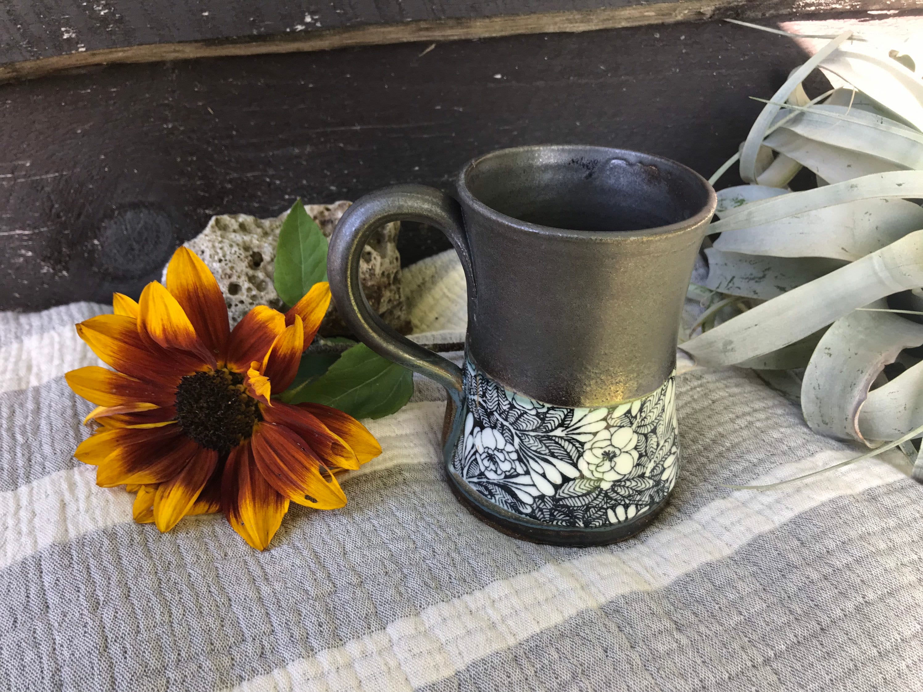Black and white mug with flowers