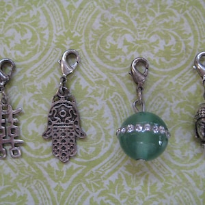 Set of Four Buddhist Inspired Charms