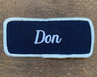 Don Work Shirt Name Patch. A Blue Patch with White Embroidered Name "Don"