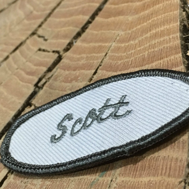 Scott. An off white oval work shirt patch that says Etsy