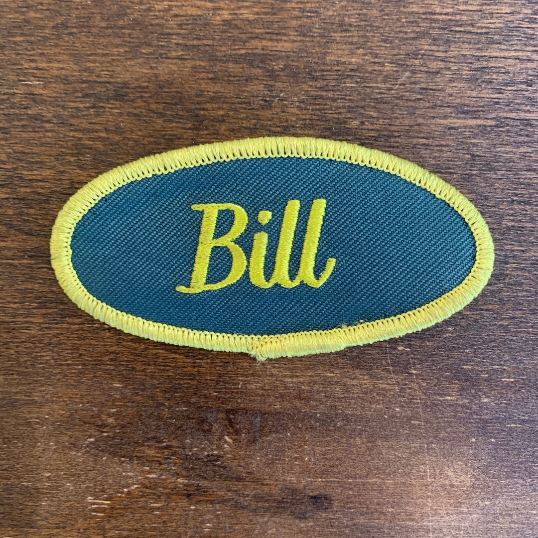 Bill A Gray Work Shirt Name Patch That Says bill in Yellow Script With