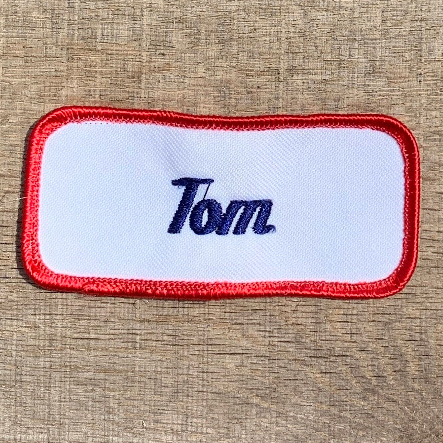 Tom. A white work shirt name patch that says Tom | Etsy