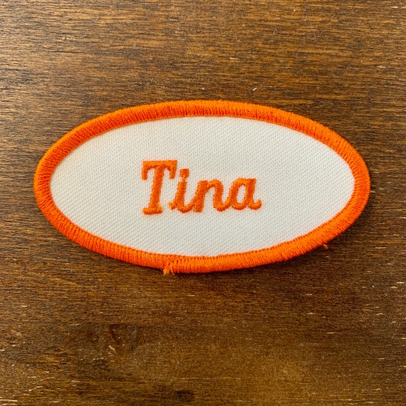 Tina A White Work Shirt Name Patch That Says Tina Gem tina-a-white-work-shirt-name-patch-that-says-tina-gem