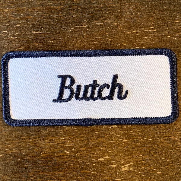 Butch. A white work shirt patch that says "Butch" in blue print with blue border