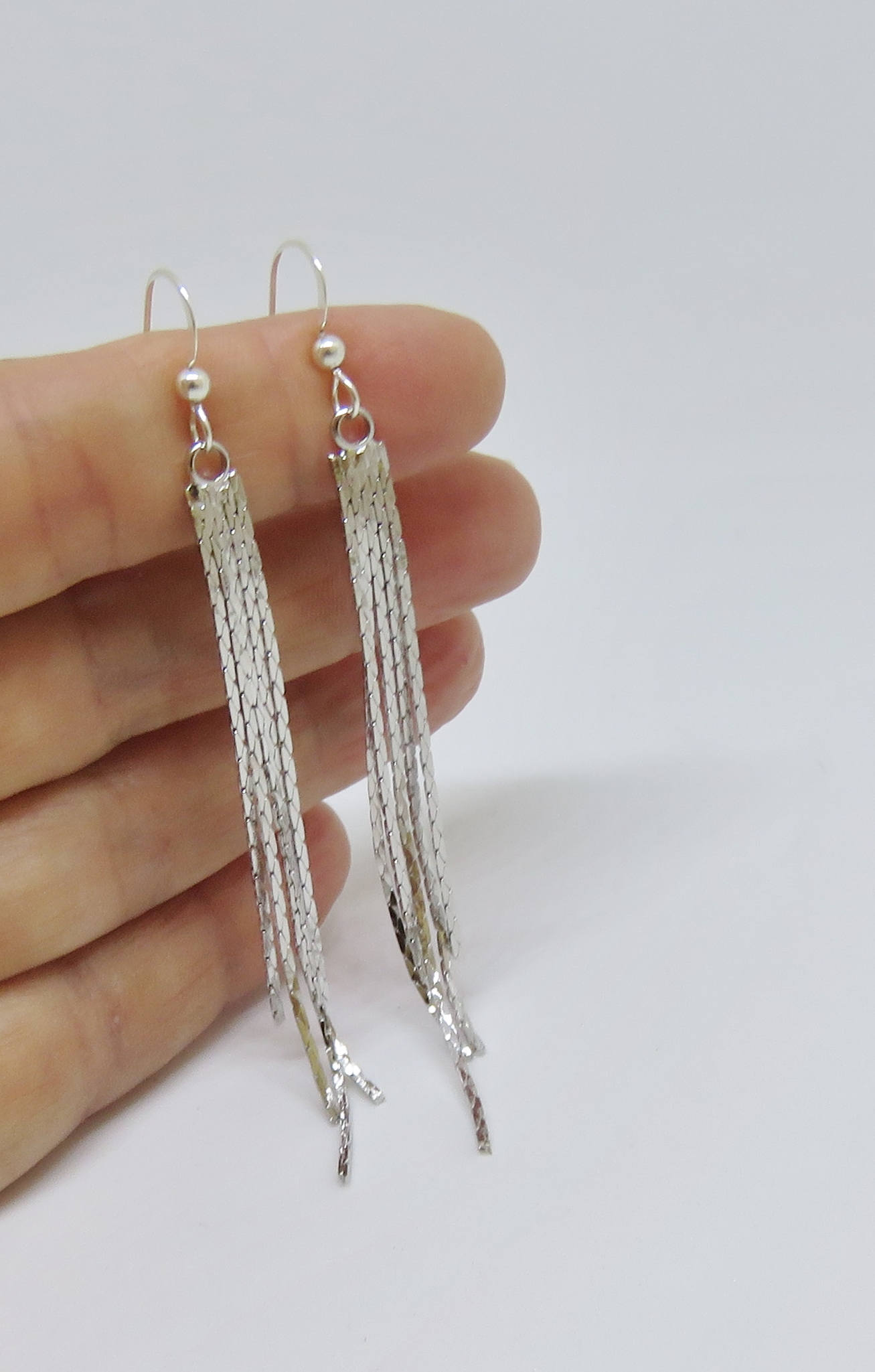 Tassel silver earrings discount