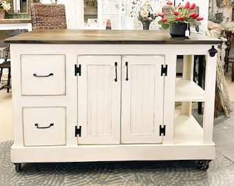 Beautiful 2 drawer island cart with storage and open shelves.