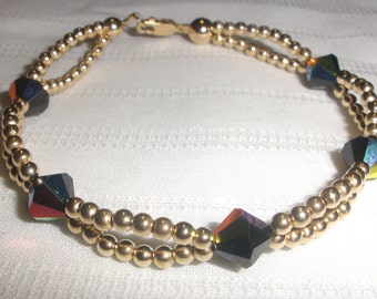 7  3/4" Gold and Black Crystal Bracelet
