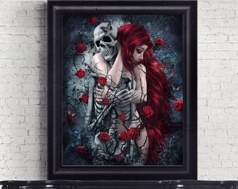 May include: A framed gothic art print featuring a woman with long red hair embracing a skeleton. The background is a dark blue with red roses and butterflies.