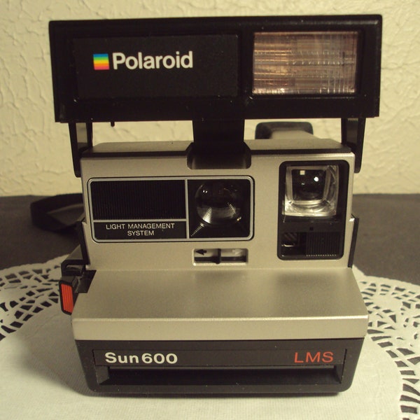 Vintage Polaroid Land camera Sun 600 LMS w/ hard carry case instructions 1980's