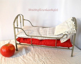 Antique doll crib bed cot 1910s with original bedding made of metal 13 by 6 inches