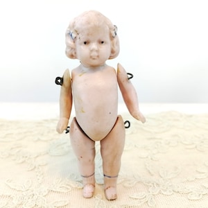 Antique Dollhouse Doll small 3 inches made by Hertwig in Germany all bisque pink tint