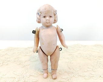 Antique Dollhouse Doll small 3 inches made by Hertwig in Germany all bisque pink tint