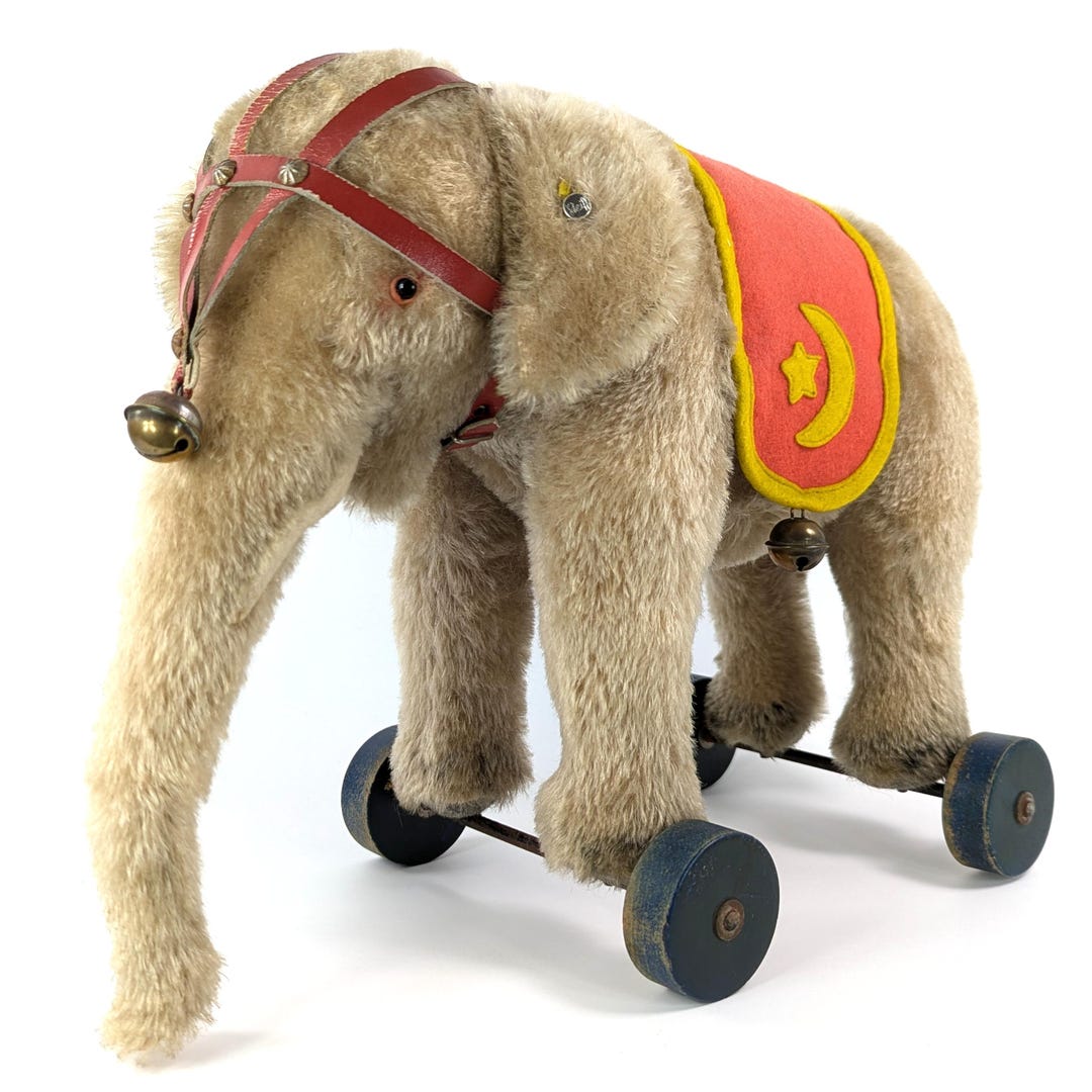 Steiff Elephant on Wooden Wheels With Button Leather Halter Steiff Elephant on Wooden Wheels With Button Leather Halter
