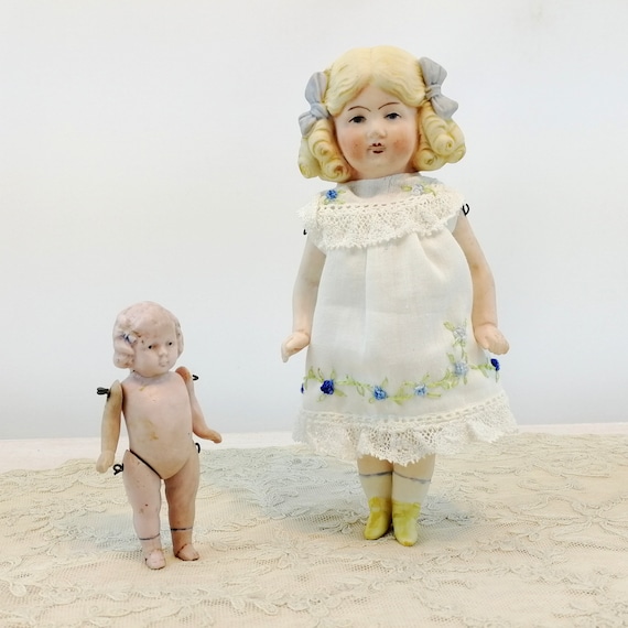 Small bisque dolls on sale