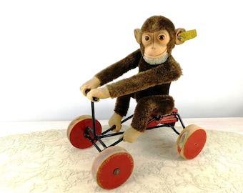 Steiff Record Peter with IDs mohair monkey sitting on carriage vintage 1949 to 1957