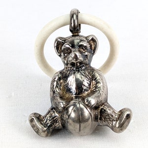 Antique Rattle Teddy Bear sitting on a ball 1920s Alpacca Silver