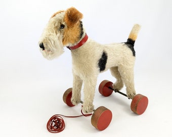 Steiff Foxterrier on eccentric wooden wheels 9 inches vintage 1949 to 1957