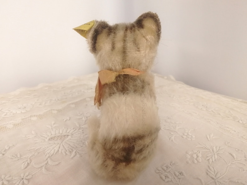 bow Vintage Steiff cat Susi with original Steiff button smallest 4 inch edition label sitting mohair tabby bell produced 1959 \u2013 1964