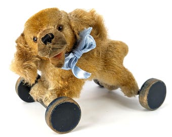 Steiff Dog Spaniel Pull Toy with IDs 4 inches eccentric wheels vintage 1954 to 1957 produced