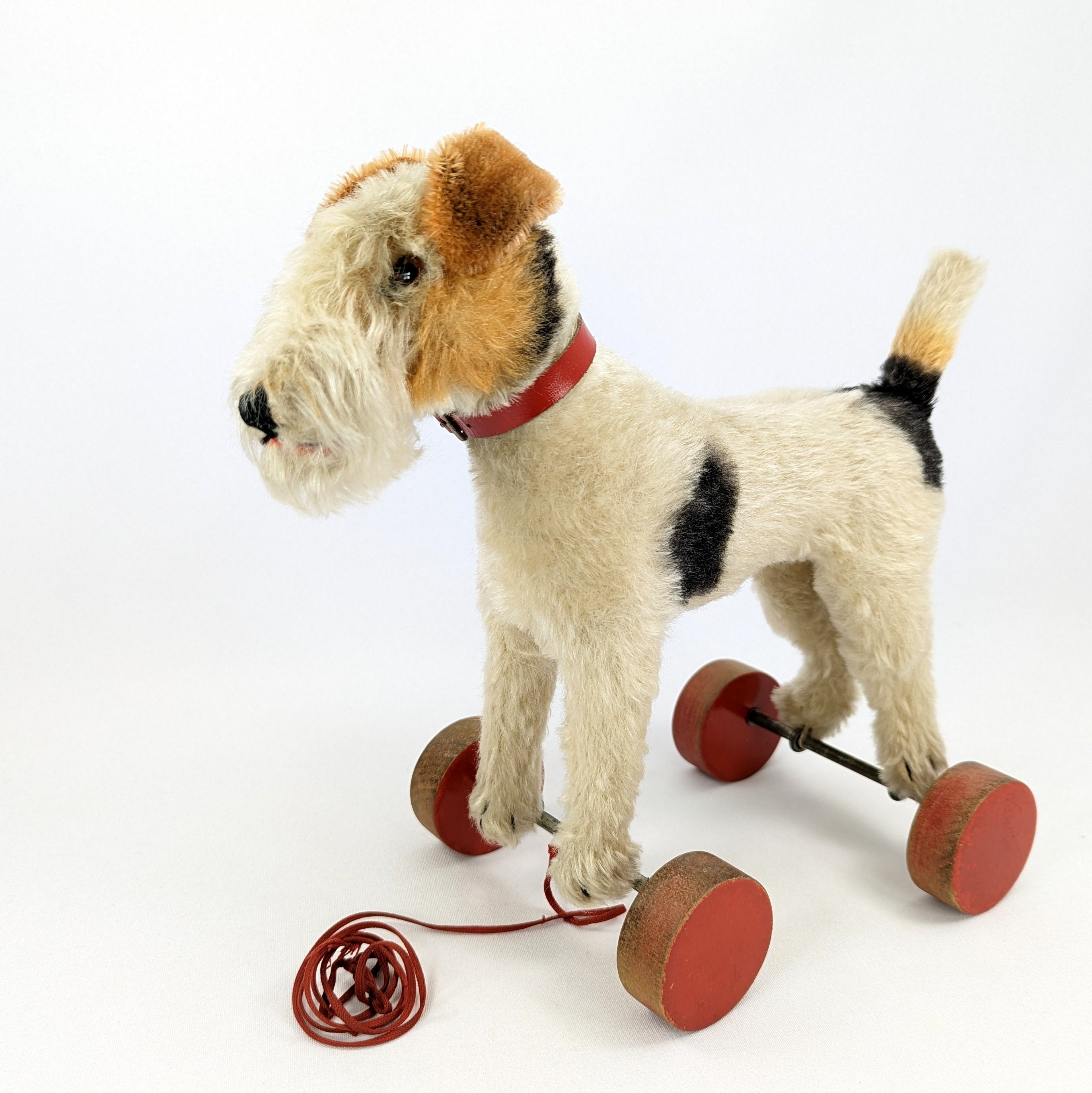 Steiff Foxterrier on Eccentric Wooden Wheels 9 Inches
