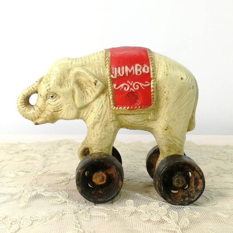 1910 stuffed elephant on wheels