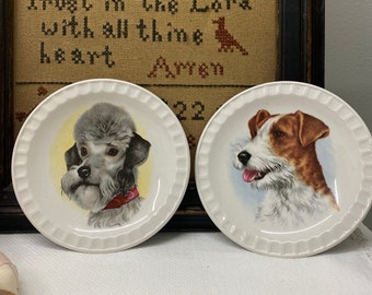 Antique dog plates (5 inch) darling paintings.  Made in England