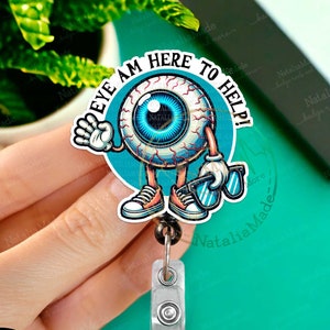 May include: A blue and white cartoon eye with a smiling face and sunglasses, wearing sneakers and holding a peace sign. The eye is on a white background with the text "EYE AM HERE TO HELP!" in a black circle. The image is a badge reel.