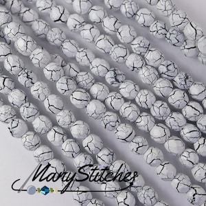 Ionic White/Jet 4mm Fire Polish - 40 beads
